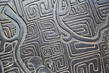 Weathered iron wall with seamless background of iron products