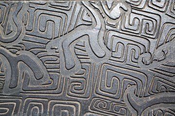 Weathered iron wall with seamless background of iron products