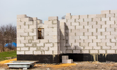 Bricks in the walls of a new unfinished house