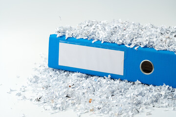 Paper folder and shredded paper in office