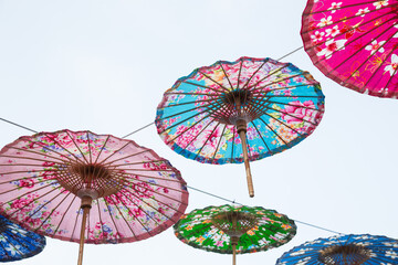 Colorful Taiwanese-style umbrellas against the sky background