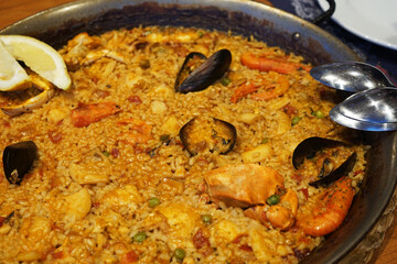 Close up seafood Paella, traditional classic Spanish recipe made of rice and Saffron