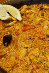 Close up seafood Paella, traditional classic Spanish recipe made of rice and Saffron