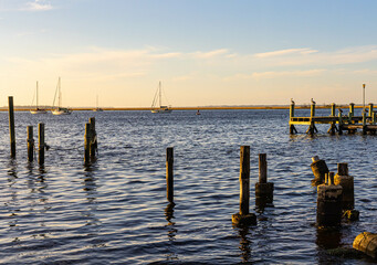 Sail Boats and Pier on The Amelia River at Sunset, Fernandina City, Amelia Island, Florida, USA