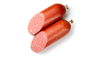 Smoked sausage cut in half on a white background. Semi-smoked sausage salami with cheese. With shadow.