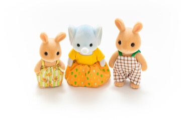 Animal doll isolated on white background. Miniature dollhouse toy. Kids toy. Animal character. Play and learn. Kids room. Childhood. Kindergarten toy. Developmental toys. Bunny toys. Easter bunny.