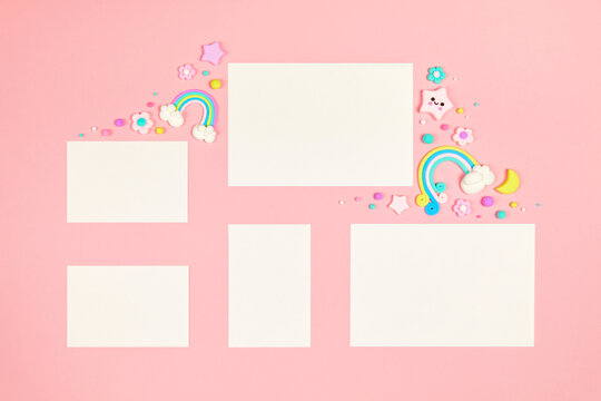 Set of five blank white cards on pastel pink background with frame of cute kawaii air plasticine handmade cartoon animals, rainbows. Empty photo frames, baby's photo book, scrapbooking design template
