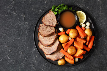 roast beef with dipping sauce and winter veggies
