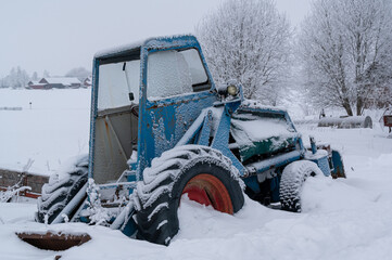 Old blue powerful farming machin backhoe loader