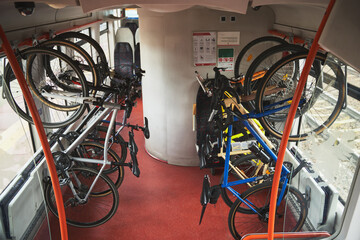 Experience the Convenience of Urban Commuting with Six Bicycles Mounted on a Train Bike Rack