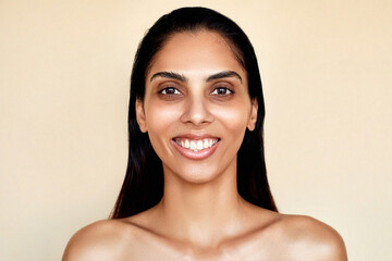 South asian young woman skincare portrait. Beautiful Indian model with a smooth bright hydrated...