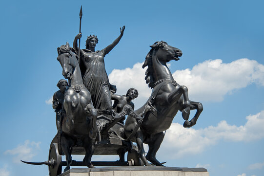 LONDON, UK - MAY 24, 2010:  Statue of Queen Boudicca in a chariot on Westminster Bridge against blue sky