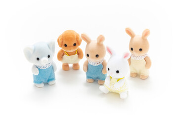 Animal doll isolated on white background. Miniature dollhouse toy. Kids toy. Animal character. Play and learn. Kids room. Childhood. Kindergarten toy. Developmental toys. Bunny toys. Easter bunny.