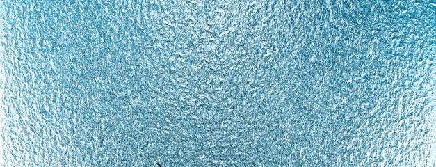 Light blue matte surface. Wet plastic glass. Frosted winter window glass. Water surface	