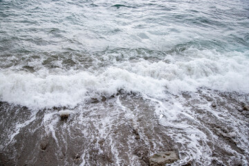 sea water at the edge of the beach