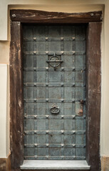 Old medieval reinforced metal door