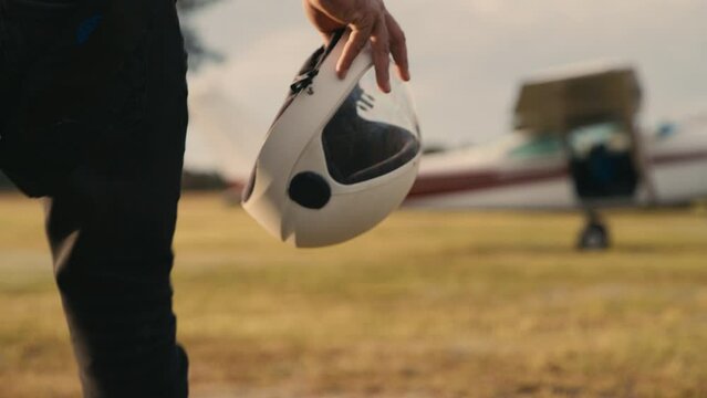 Close-up shot of the skydivers helmet while entering the airplane