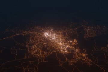 Obraz premium Aerial shot on Santa Fe (New Mexico, USA) at night, view from west. Imitation of satellite view on modern city with street lights and glow effect. 3d render