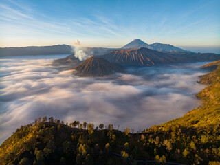 Aerial drone view of Bromo active volcano at sunrise,Tengger Semeru national park, East Java, Indonesia - 720043408