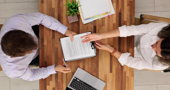 Businessman signs contract and has a successful meeting on business agreement in office