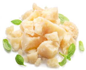 Delicious parmesan cheese and basil leaves isolated on white background.