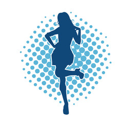 Silhouette of a female dancer wearing mini skirt in action pose. Silhouette of a slim woman dancing happily.