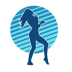 Silhouette of a slim female in dance pose. Silhouette of a woman dancing.