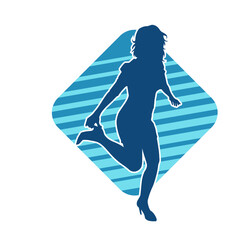 Silhouette of a slim female in dance pose. Silhouette of a woman dancing.