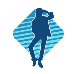 Silhouette of a slim female in dance pose. Silhouette of a woman dancing.