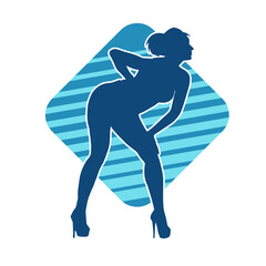 Silhouette of a slim female in dance pose. Silhouette of a woman dancing.