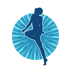 Silhouette of a slim female in dance pose. Silhouette of a woman dancing.