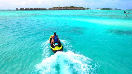 Maldives - Huraa Island - jet skiing in the blue lagoon