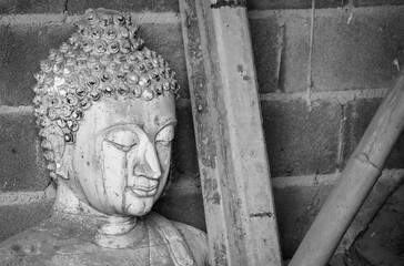 Buddha sandstone statue in temple Thailand, Black and white picture. - 720119209