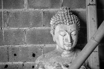 Buddha sandstone statue in temple Thailand, Black and white picture. - 720119210