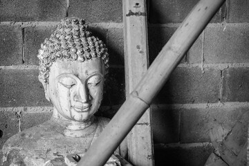 Buddha sandstone statue in temple Thailand, Black and white picture. - 720119226