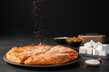 Bakery. Delicious Homemade cheese pie with pastry. Bulgarian banitsa. Traditional Romanian baked...