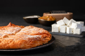 Bakery. Delicious Homemade cheese pie with pastry. Bulgarian banitsa. Traditional Romanian baked...