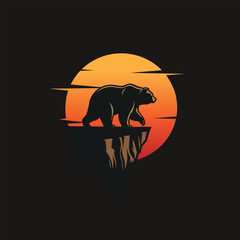 bear walking on a cliff silhouette logo vector graphic illustration