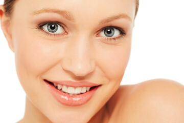 Obraz premium Skincare, spa and portrait of woman on a white background for wellness, cosmetics and facial. Dermatology, salon and isolated face of person with natural, healthy skin and beauty aesthetic in studio
