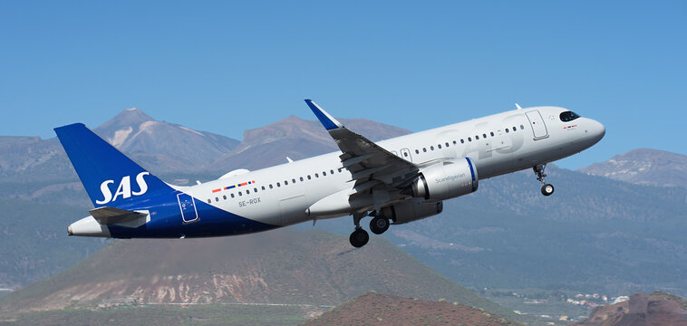 Tenerife, Spain January 21 st, 2024 Airbus A320-251N. SAS Airlines flies in the sky, El Teide volcano in the background