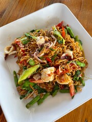 stir fried noodles. Thai Drunken Noodles with seafood. Pad Kee Mao Talay.