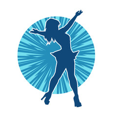 Silhouette of a female dancer wearing mini skirt in action pose. Silhouette of a slim woman dancing happily.