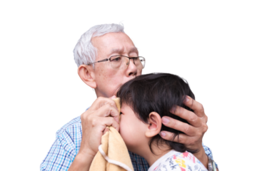 Grandfather Comforting Crying Child with Care, An elderly man in glasses comforting a young child who is crying from pain, depicting a nurturing family moment, isolated background.
