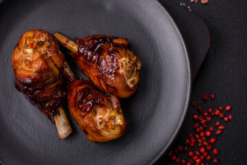 Delicious grilled chicken legs with spices and herbs in teriyaki sauce
