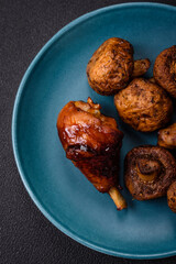 Delicious grilled chicken legs with spices and herbs in teriyaki sauce