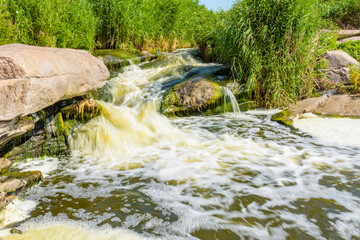 View on Tokovsky waterfalls and rapids on the Kamianka river. Dnipropetrovsk region, Ukraine