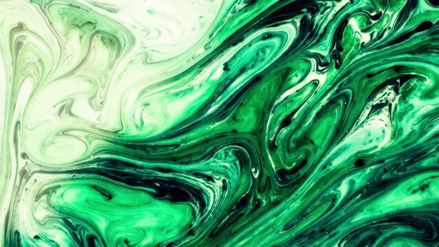 Abstract background video chemical processes movement of green and black liquid. High quality 4k footage