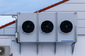 heat pump on a house wall