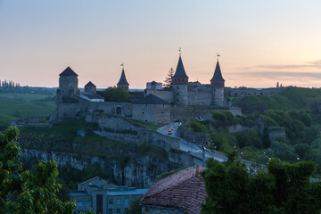 Evening view of mediaeval fortress in Kamianets-Podilskyi city, Ukraine.