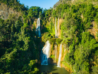 Naklejka premium Aerial View The most beautiful waterfalls in Thailand..Thi Lo Su Waterfall The Largest Waterfall in Thailand.Thi Lo Su Waterfall stands tall as a hidden gem within Umphang Wildlife Sanctuary.